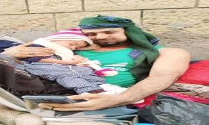 مناشدات واسعة للعفو عن عيسى التاج بعد صورة مؤثرة مع طفله